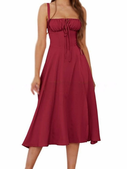 Solidna sukienka na ramiączkach z wiązaniem